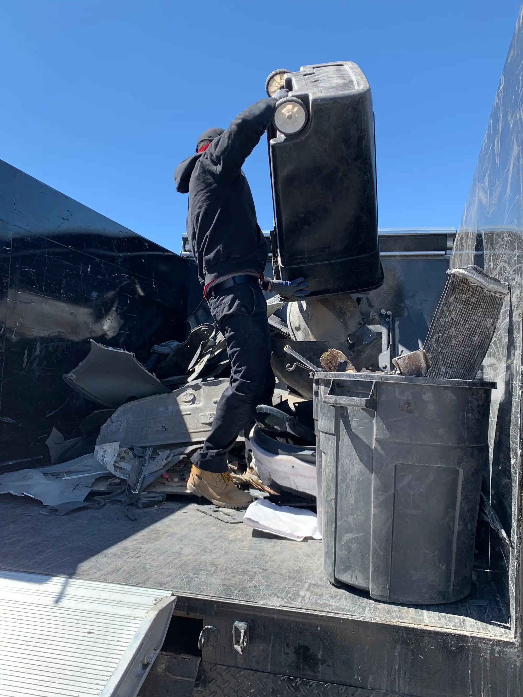 Our crew doing a Garage cleanout in Commerce City, Colorado